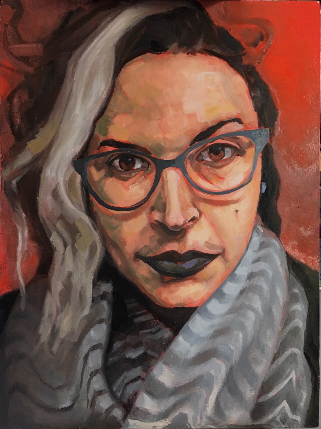 In this painted portrait, the author, a genderqueer Palestinian person with long wavy black hair with a pale streak in front, is staring directly at the viewer from against a fiery orange background. They are wearing large horn-rimmed glasses and a grey and black rippled scarf. Their turquoise stud earring is visible on the right ear.